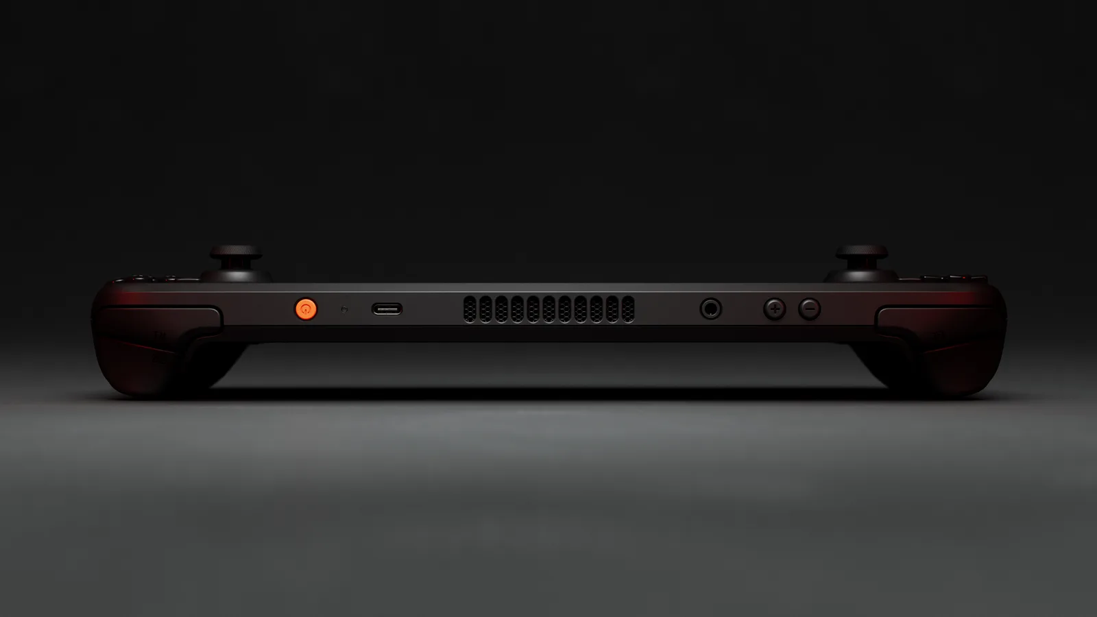 Steam Deck OLED edge view showing the power button, USB-C port, and headphone jack
