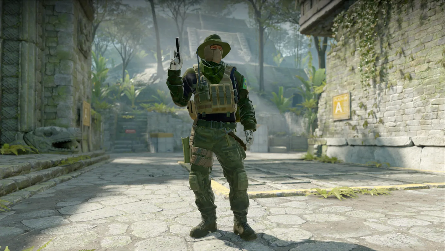 Counter-Strike 2 art: a soldier in green fatigues and a bucket hat raising a pistol in a mossy stone temple courtyard