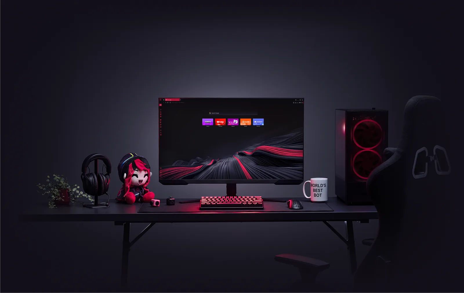 A dark gaming desk with Opera GX open on the monitor, a red-lit PC tower, headphones on a stand, a mascot plush and a mechanical keyboard